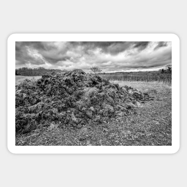 Muck heap in an arable field in the English countryside Sticker by yackers1